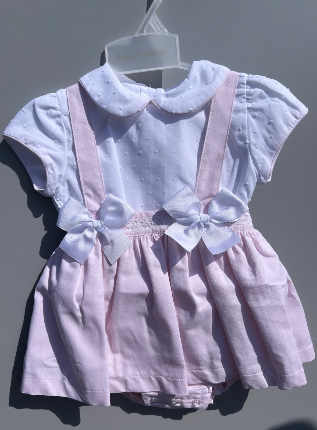 Pretty Originals White Plumeti Detail Top With Pink Bow Pinafore